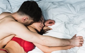 A couple trying sex positions for endometriosis.