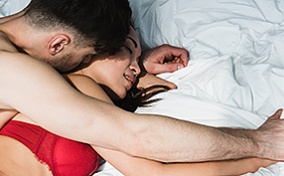 A couple trying sex positions for endometriosis.