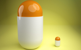 A larger and a smaller amphetamine pill side by side.