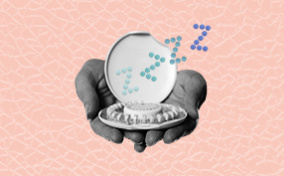 A pair of hands holding a sleeping birth control case.