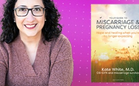 Kate White poses beside her book on pregnancy loss.