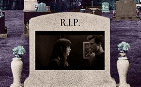 A steamy movie scene plays on a tombstone.