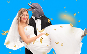 bride-being-held-by-groom-with-dolphin-head