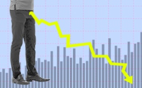 Chart-showing-downward-trend-from-standing-man