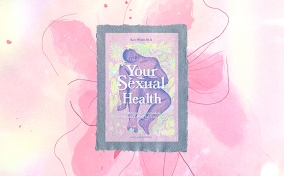 The cover of Your Sexual Health by Kate White sits atop a pink flower.