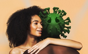 A woman hugs another person with Coronavirus for a head.