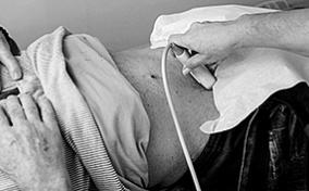 An-ultrasound-machine-looks-at-a-mans-pelvis