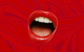 An open mouth with red lips is on a swirled red background. 