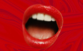 An open mouth with red lips is on a swirled red background. 