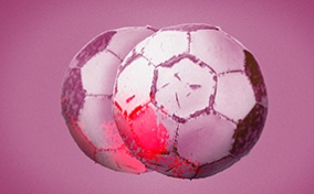 Two peeling soccer balls sit side by side on a purple background with one area highlighted red.