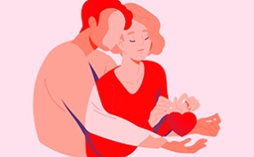 A man holds a woman from behind with a heart held in her hands.