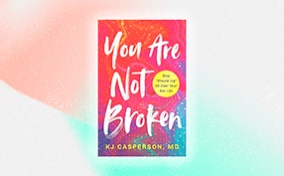 The cover of You Are Not Broken is on a pink, white, and mint background.