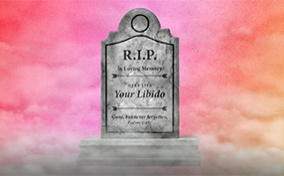 A tombstone for your libido is placed against a multicolor cloudy background with white clouds beneath it.