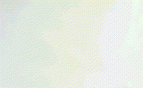 A thick white liquid pours into more white liquid.