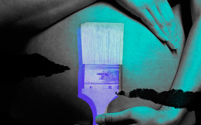 A pregnant person wraps their arms around the top and bottom of their baby bump, and a purple paintbrush lays over the belly.