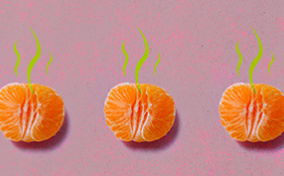 Three unpeeled tangerine halves lay in a row against a pink surface with green smell lines coming from the top.
