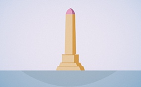 A flesh-colored obelisk monument with a pink tip stands in the middle of a blue surface.