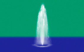 A fountain shoots water upwards in the middle of blue water against a green background.