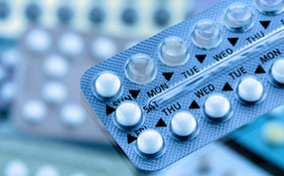 A package of pills shows the days of the week with some pills missing.