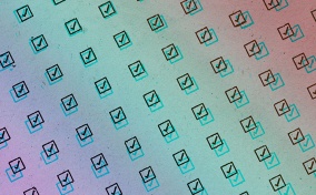 A pattern of checked boxes repeat on a rainbow-colored background.