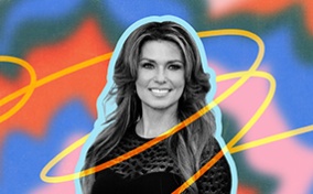 A black and white photo of Shania Twain is in front of a colorful background.