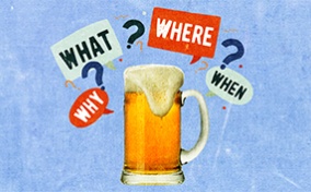 A glass beer stein overflows with foam and is surrounded by the words "who," "what," "where," "when," and two question marks. 