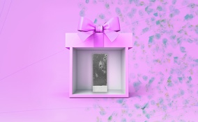 A purple gift box is open on the front to show cell samples from a pap smear.
