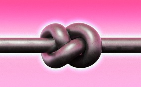 A long brown tube is tied into a knot against a pink background.