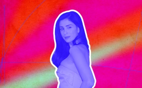 A purple image of Sarah Silverman is over a neon red and pink background.