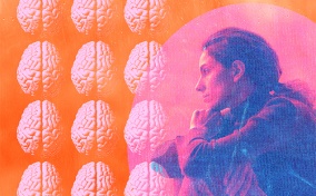 A pattern of pink brains is next to a woman sitting down on the ground with her arms around her knees.