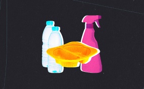 A plastic disposable food container sits between two bottles of water and a chemical cleaner.
