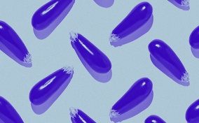 A pattern of purple eggplants cast shadows along an off-white surface.