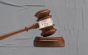 A gavel has a label for mifepristone around it.