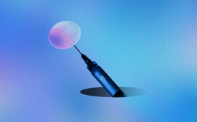 An IVF needle comes up out of a hole in the ground to poke an egg.