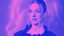 Trans actress Hunter Schafer from the TV show Euphoria poses for press photos with a purple overlay.