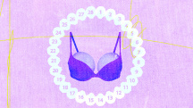 A purple bra with circles in the cups is surrounded by the numbers 1 through 28.