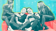 four young adults sitting and laughing on a red couch on a blue background
