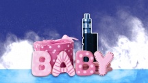 Pink cookies that spell out BABY are next to a pink polka-dot gift box and a black vape with clouds in the background.